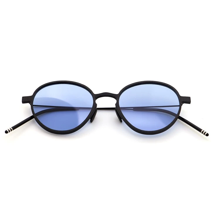 round carbon fiber sunglasses manufacturer with blue polarized lenses and striped metal temple tips round carbon fiber sunglasses manufacturer with blue polarized lenses and striped metal temple tips